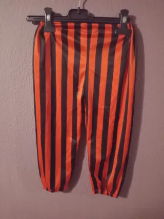 Pantalones de disfraz rayas naranja y negro