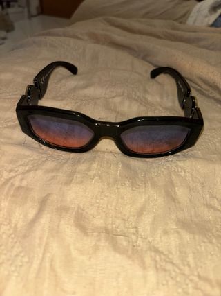 Occhiali da sole finti Versace neri e arancio