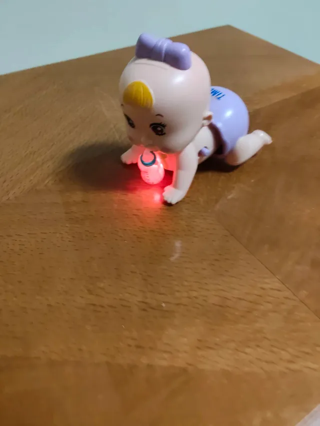 Juguete bebé gateando con luz y movimiento