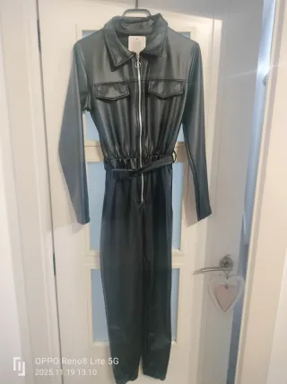 Mono cuero negro cremallera cinturón