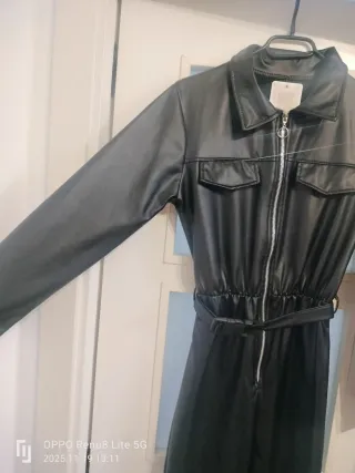 Mono cuero negro cremallera cinturón