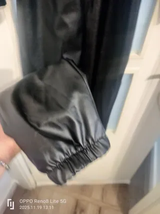 Mono cuero negro cremallera cinturón