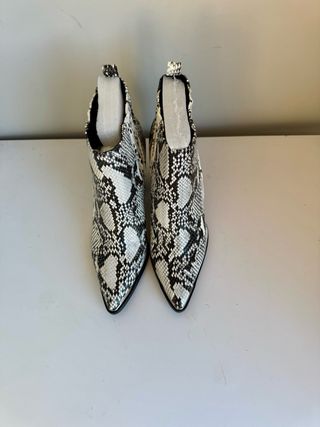 Stivaletti Exé donna pitonati tacco alto