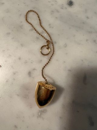 Péndulo radiestesia dorado con cadena