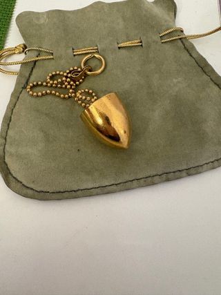 Péndulo radiestesia dorado con cadena