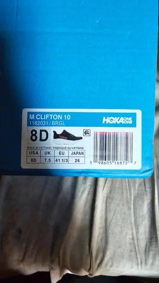 Zapatillas Hoka Negras y Doradas