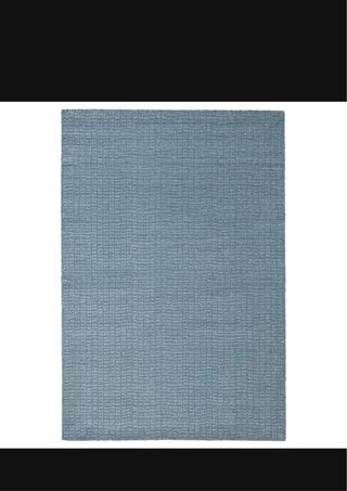 Alfombra azul y blanca de poliéster