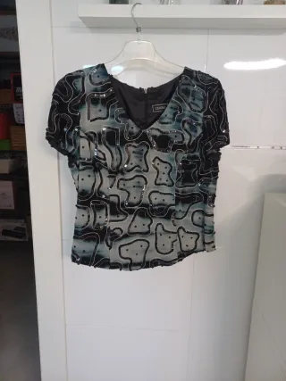 Conjunto falda, chaqueta y blusa negro