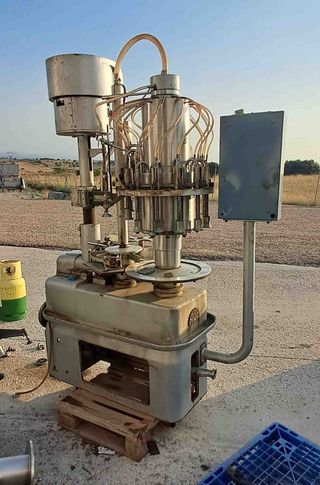 Máquina llenadora de botellas industrial