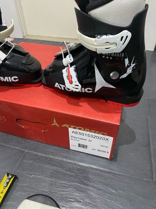 Esquis y botas niño .