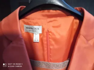 Traje de fiesta naranja con encaje