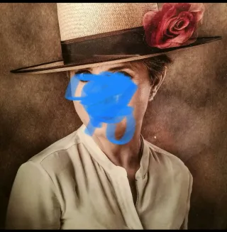 Falda marrón amazona y sombrero.