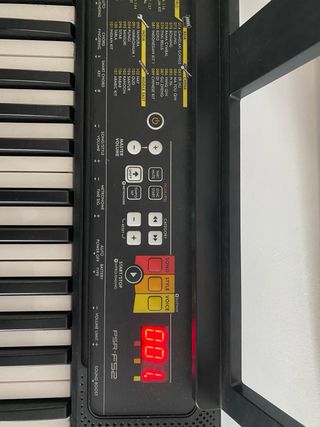 Piano Eléctrico con Soporte y Partituras