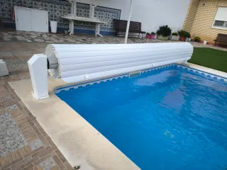 Cubierta de piscina enrollable de 7x4