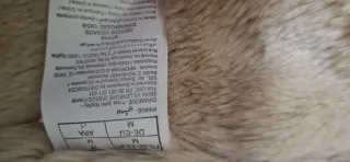 Parka verde con capucha y pelo