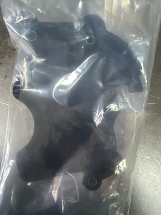 Protector piñón KTM 60030060044