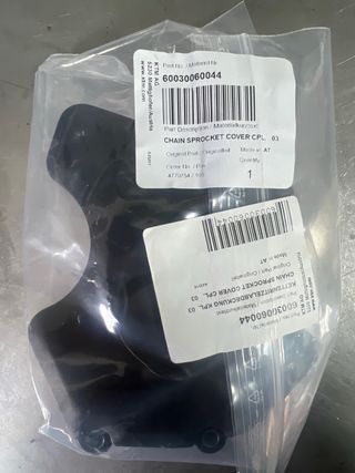 Protector piñón KTM 60030060044