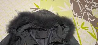 Giaccone imbottito grigio lucido con cappuccio