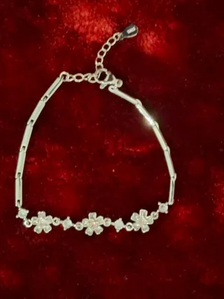 Pulsera plata con flores y circonitas