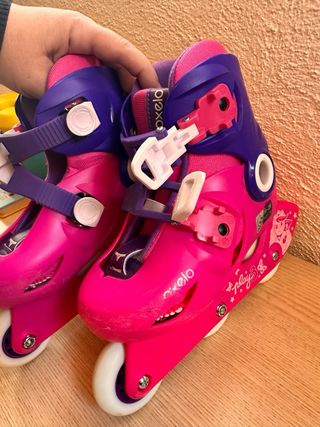 Patines infantiles Oxelo rosas y morados.