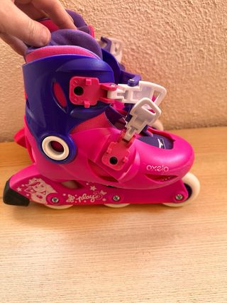 Patines infantiles Oxelo rosas y morados.