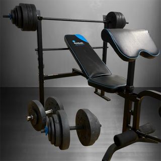 Panca multifunzione per palestra + dischi + manubri.