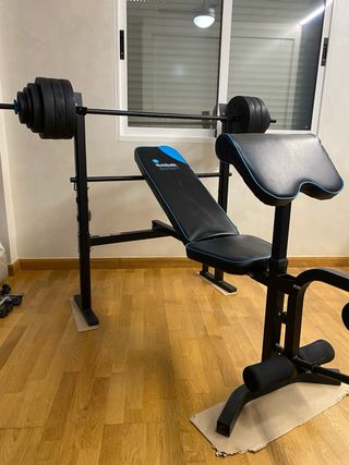 Panca multifunzione per palestra + dischi + manubri.