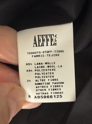 Traje de chaqueta y falda. Moschino