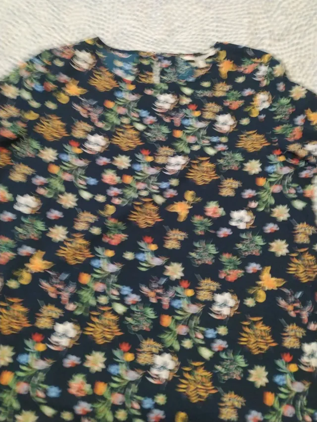 Blusa estampada flores, con mangas volante