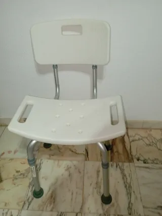 Silla de ducha con respaldo