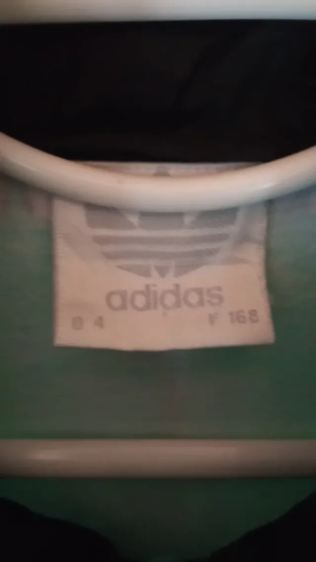 Chaqueta Adidas cremallera azul y negra