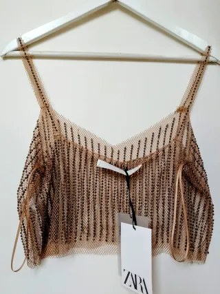 Top de tul color maquillaje con pedrería gris