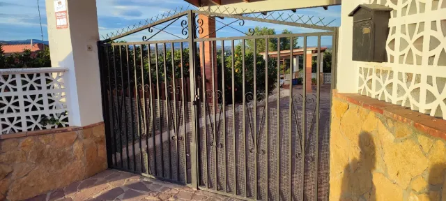 Puerta metálica de hierro forjado