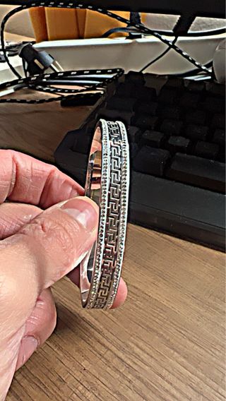 Pulsera de acero plateada y dorada con baño de oro