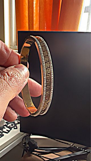 Pulsera de acero plateada y dorada con baño de oro