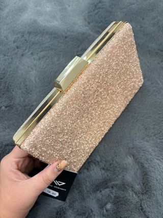 Bolso de fiesta con brillos dorado