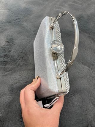 Bolso de fiesta con brillos dorado