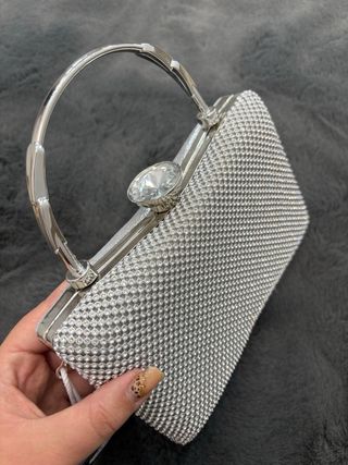 Bolso de fiesta con brillos dorado