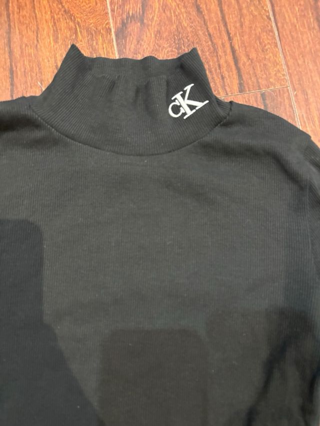 Jersey cuello alto Calvin Klein negro
