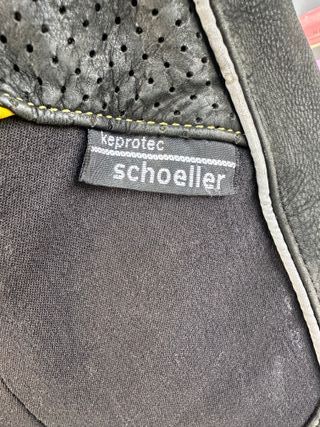 Chaqueta de moto cuero negra y amarilla