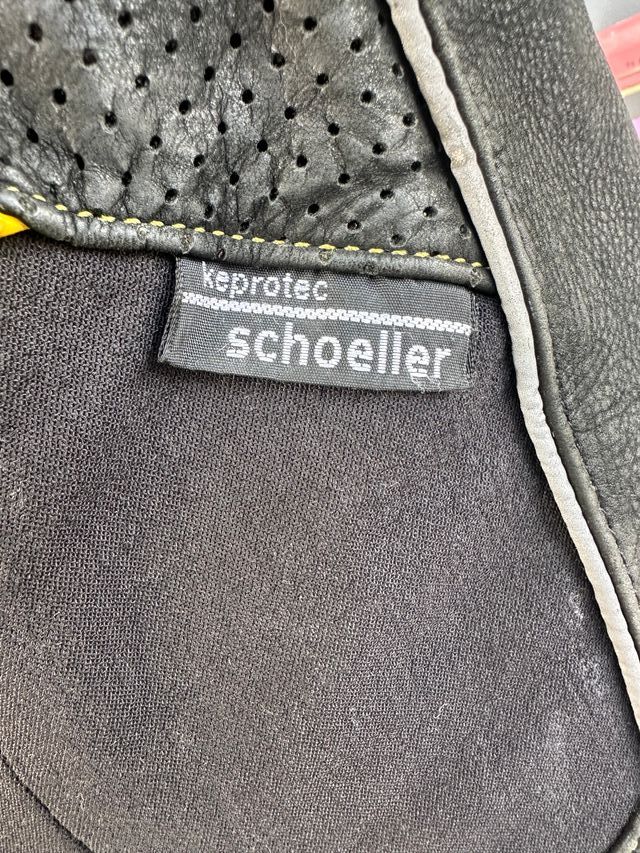 Chaqueta de moto cuero negra y amarilla