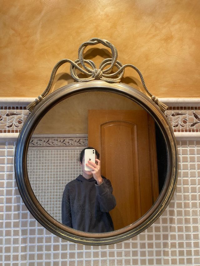 Espejo de pared vintage con marco dorado