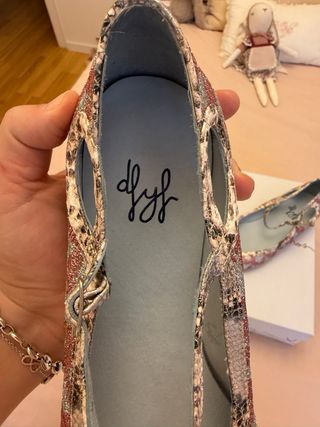 Bailarinas brillo de la marca de flores y floreros