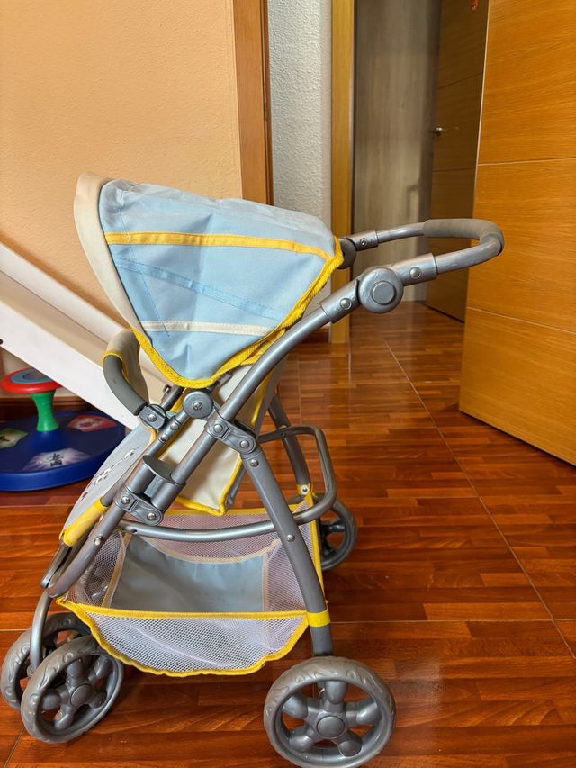 Carrito de muñecas azul y amarillo