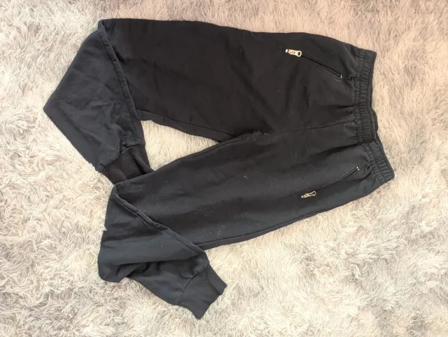 Chándal negro con cremalleras