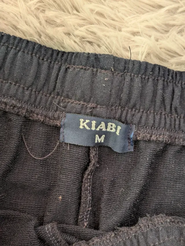 Chándal negro con cremalleras