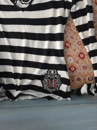 Lotto di 4 capi d'abbigliamento donna