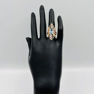 LANZADERA GRANDE PIEDRA AZUL. Oro 18k.