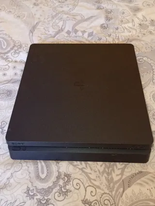 PS4 Slim 500GB + Mando Original.