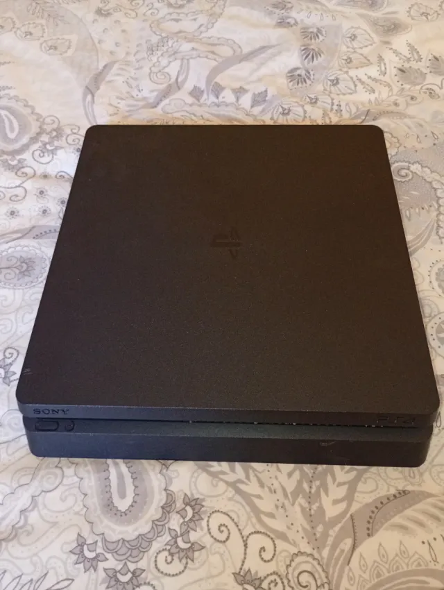PS4 Slim 500GB + Mando Original.